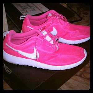 Pink and white bike roshe